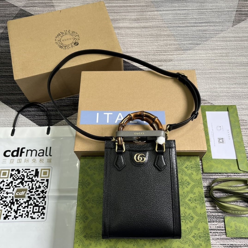 G*u*i top handle bags